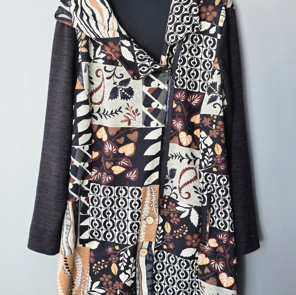 Long-sleeve, hooded asymmetrical zip-up jacket.  Patchwork design. - Picture 8 of 8